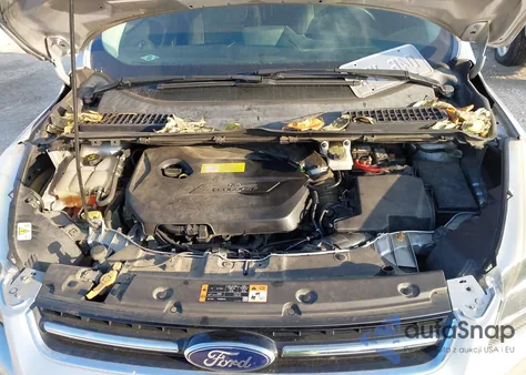 2014 Ford Escape Titanium z USA, uszkodzony, nr VIN 1FMCU0JXXEUC19573